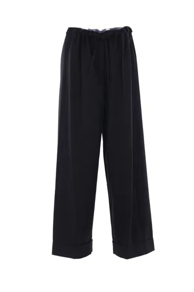 The Row Trousers In Black