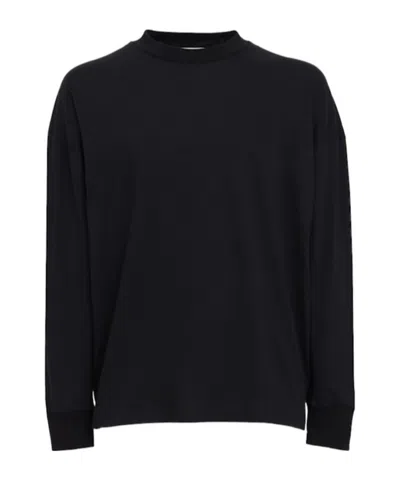 The Row Turtleneck Longsleeve Top In Black