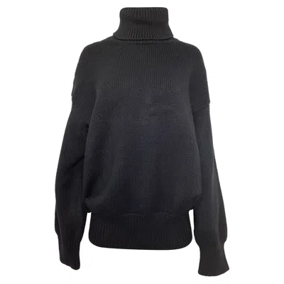 THE ROW TURTLENECK SWEATER IN BLACK MERINO WOOL