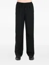 The Row Wool Trousers In Black