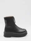The Row Zipped Boots In Black