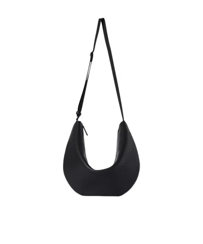 The Row Zipper Shoulder Bag In Black