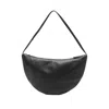 The Row Zippered Shoulder Bag In Black