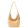 The Sak Sequoia Hobo Bag In Yellow