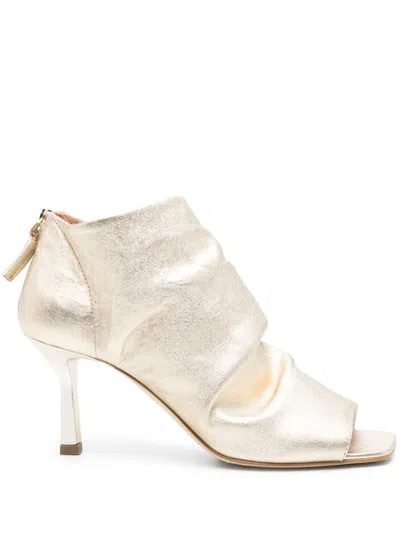 The Seller 75mm Pleat-detailed Boots In Gold