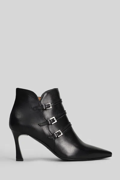 THE SELLER HIGH HEELS ANKLE BOOTS IN BLACK LEATHER