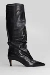 The Seller Pointed-toe Leather Boots In Black