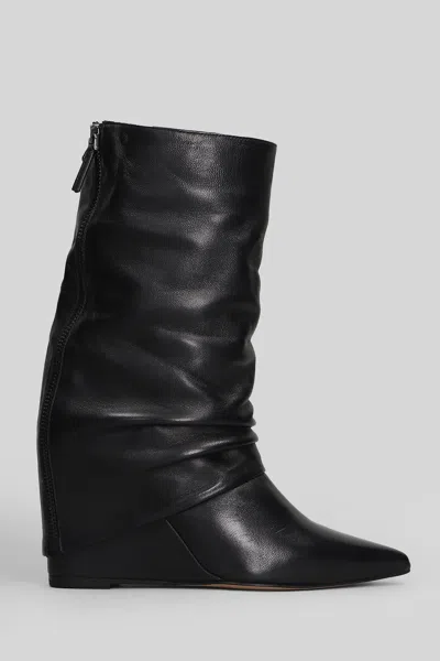 THE SELLER HIGH HEELS BOOTS IN BLACK LEATHER