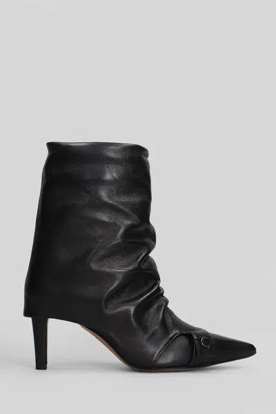 THE SELLER LOW HEELS ANKLE BOOTS IN BLACK LEATHER