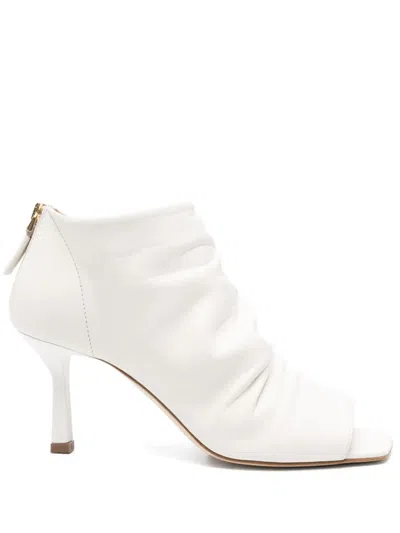 THE SELLER OPEN-TOE HEELED ANKLE BOOTS