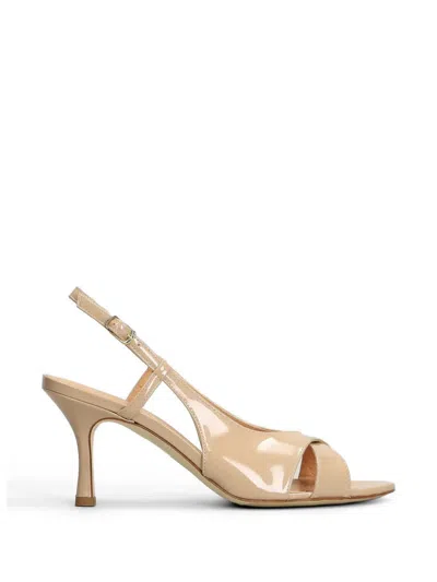 The Seller Patent-finish Crossover-strap Sandals In Neutral