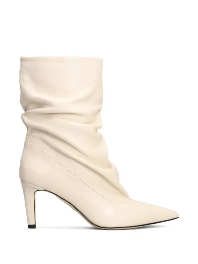 The Seller Slouchy Pointed-toe Ankle Boots In White
