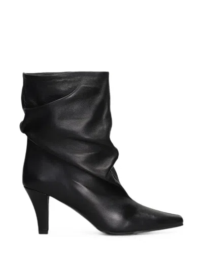 The Seller Slouchy Pointed-toe Leather Ankle Boots In Black
