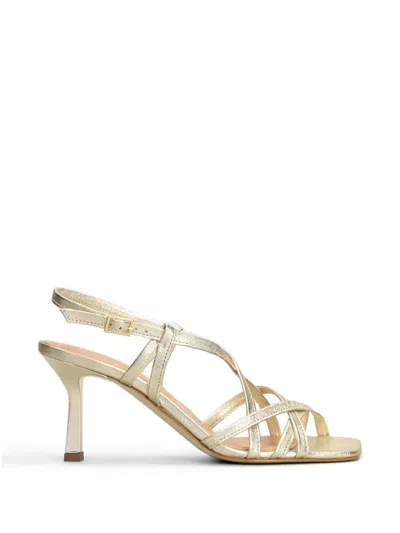 The Seller Strappy Metallic-effect Sandals In Gold