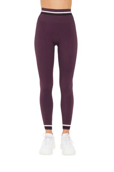 THE UPSIDE FORM SEAMLESS MIDI PANT IN DARK PURPLE