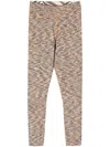 The Upside Nika Reversible 25in Midi Leggings In Brown