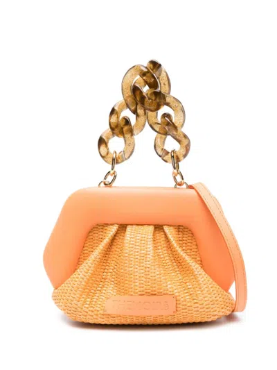 Themoirè Orange Straw Weaved Clutch With Logo Patch And Chain-link Handle