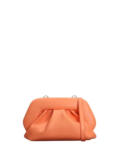 Themoirè Gea Vegan Clutch In Orange Faux Leather In Yellow