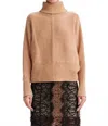 Theo The Label Pallas Dolman Turtleneck Sweater In Nutshell In Brown