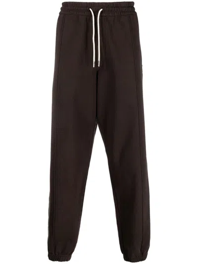 There Was One Drawstring Cotton Track Trousers In Brown