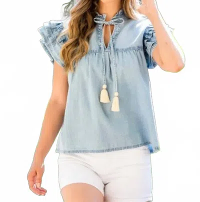 Thml Kenzie Ruffle Sleeve Tassel Tie Top In Light Denim In Blue