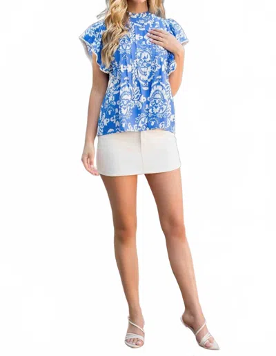 THML PLEATED FLUTTER SLEEVE PRINT TOP IN BLUE