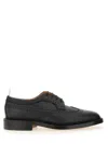 Thom Browne Pebbled Longwing Brogues In Black