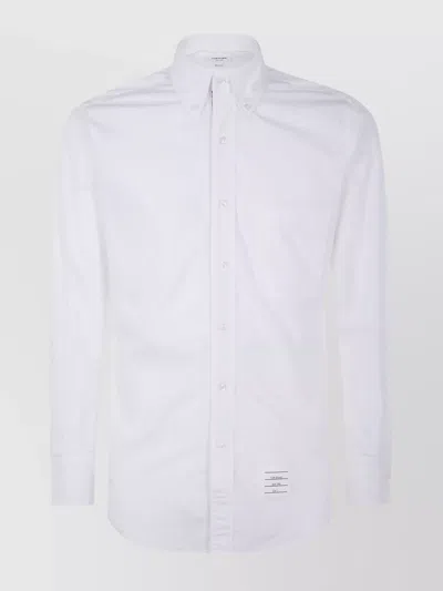 THOM BROWNE BUTTON-DOWN SHIRT WITH CURVED HEM AND POCKET