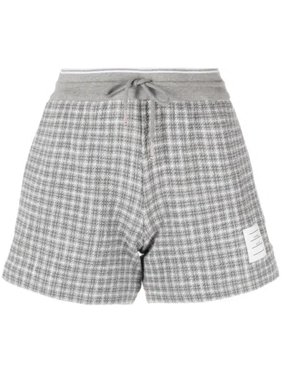 THOM BROWNE CHECKED TWEED TRACK SHORTS