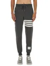 Thom Browne Tapered Grey Cotton Jogger Pants With Ribbed Cuffs And Signature Accents In Gray