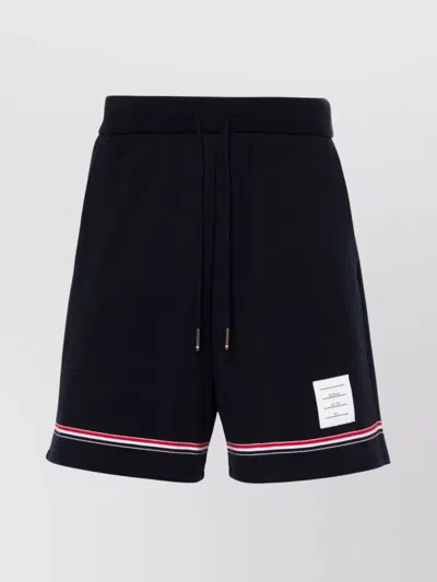 THOM BROWNE COTTON INTERLOCK MID THIGH SHORTS WITH RWB STRIPE