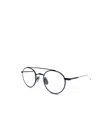 Thom Browne Eyewear Round Frame Glasses In White
