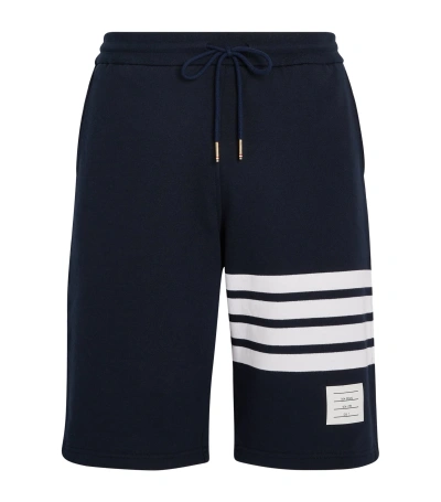 THOM BROWNE FOUR-STRIPE SHORTS