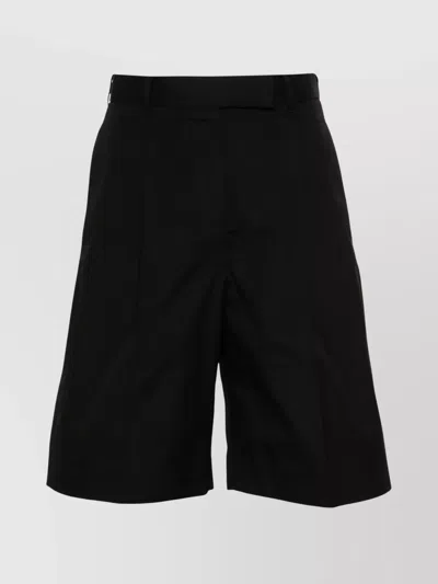 THOM BROWNE HIGH WAISTED PLEATED SHORTS