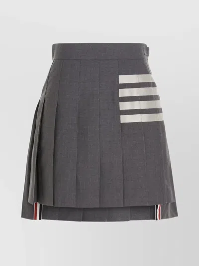 THOM BROWNE HIGH-WAISTED STRIPED PLEATED MINI SKIRT