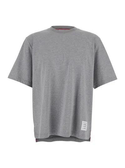 THOM BROWNE GREY CREWNECK T-SHIRT WITH LOGO PATCH ON THE FRONT AND STRIPED DETAIL ON THE REAR