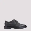 Thom Browne Pebbled Longwing Brogues In Black
