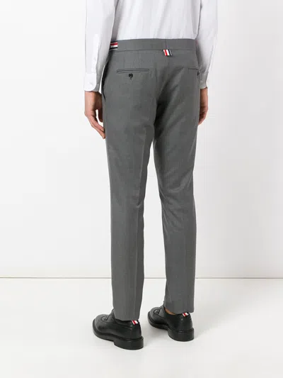 Thom Browne Low Rise Skinny Side Tab Trousers Men In Gray