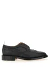 Thom Browne Pebbled Longwing Brogues In Black