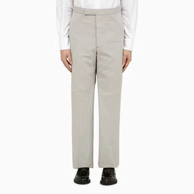THOM BROWNE MEN'S LIGHT GREY PINSTRIPE TROUSERS FOR SPRING/SUMMER 2024