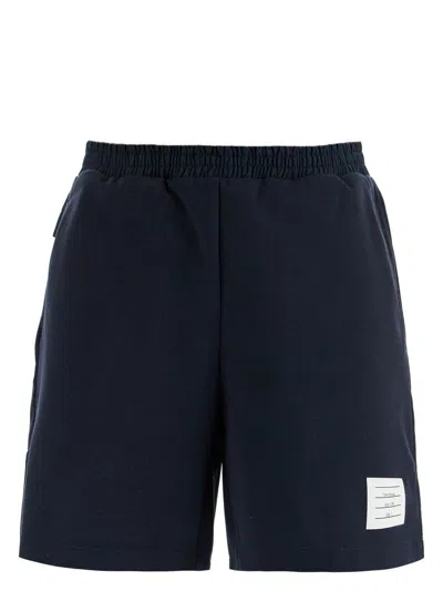 THOM BROWNE MEN'S NAVY COMBO MID THIGH RIPSTOP AND WOOL SHORTS