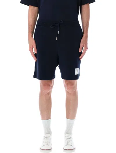 THOM BROWNE THOM BROWNE MIDI SHORTS IN TEXTURED COTTON