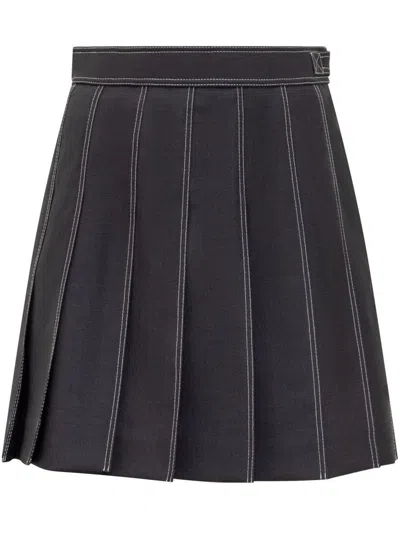 Thom Browne Mini Pleated Skirt. In Blue