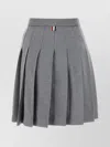 THOM BROWNE MINI SKIRT WITH LATERAL SLITS AND SIGNATURE STRIPE