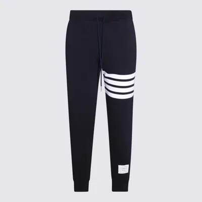 THOM BROWNE THOM BROWNE NAVY BLUE AND WHITE COTTON 4-TRACK PANTS