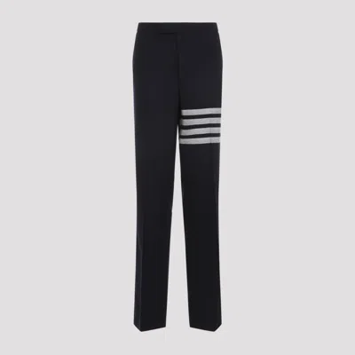 THOM BROWNE NAVY BLUE LOW RISE DROP CROTCH BACKSTRAP WOOL TROUSERS