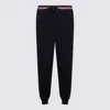 Thom Browne Rwb Stripe Detailed Drawstring Pants In Black