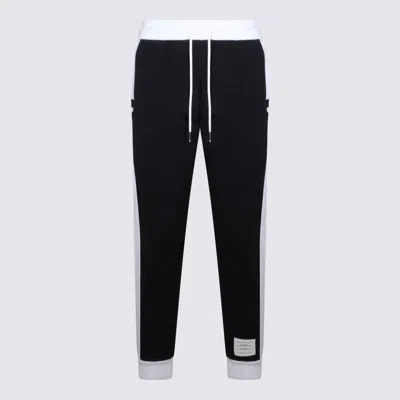 Thom Browne Pantaloni Blu In Black