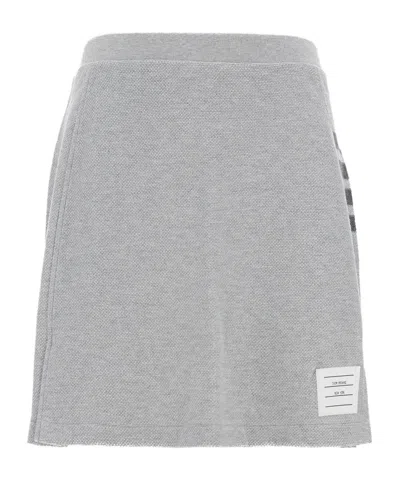 Thom Browne Pique Label Appliqué 4-bar Mini Skirt In Gray