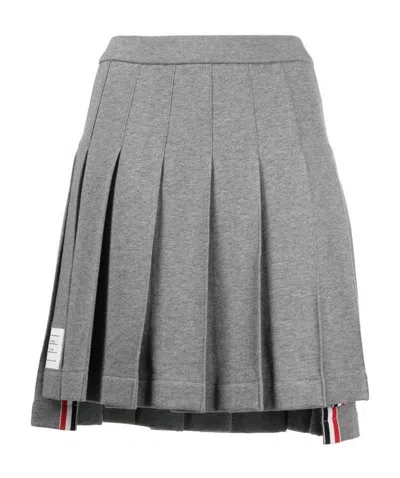 THOM BROWNE THOM BROWNE HIGH-LOW HEM PLEATED SKIRT